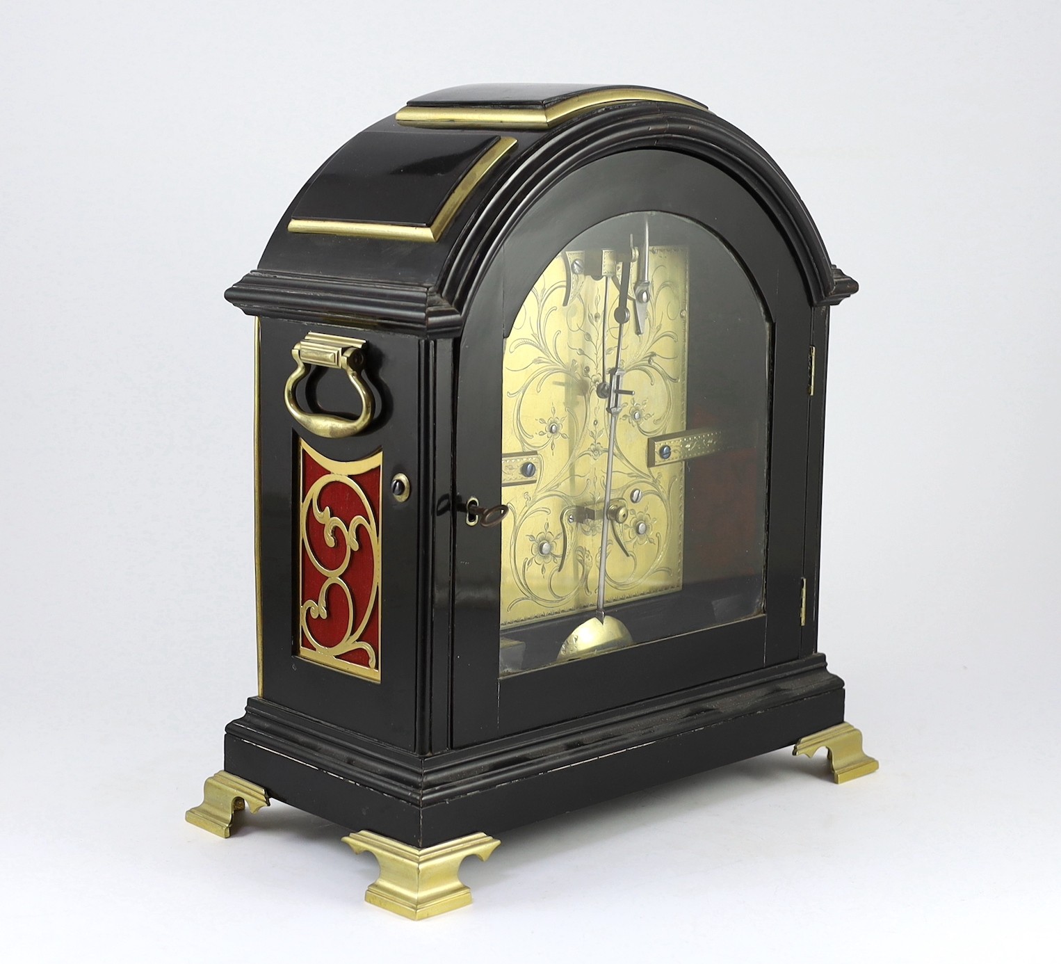 James Stewart of Glasgow. A Regency brass mounted ebonised bracket clock, 34cm wide 38cm high